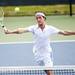 Ann Arbor resident Erik Bruley hits a ball at the net during the Ann Arbor City Tennis Tournament on Sunday, July 14. Daniel Brenner I AnnArbor.com